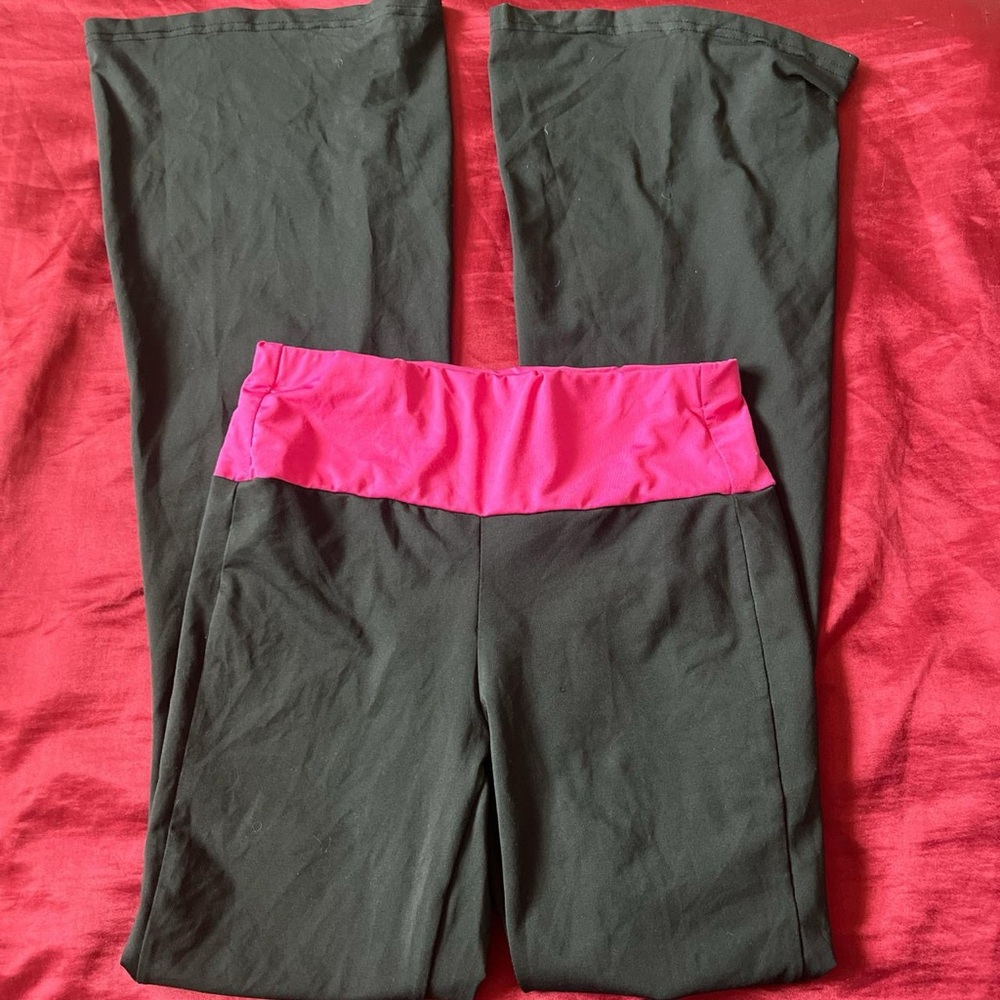 Black and Pink Foldover flared leggings.